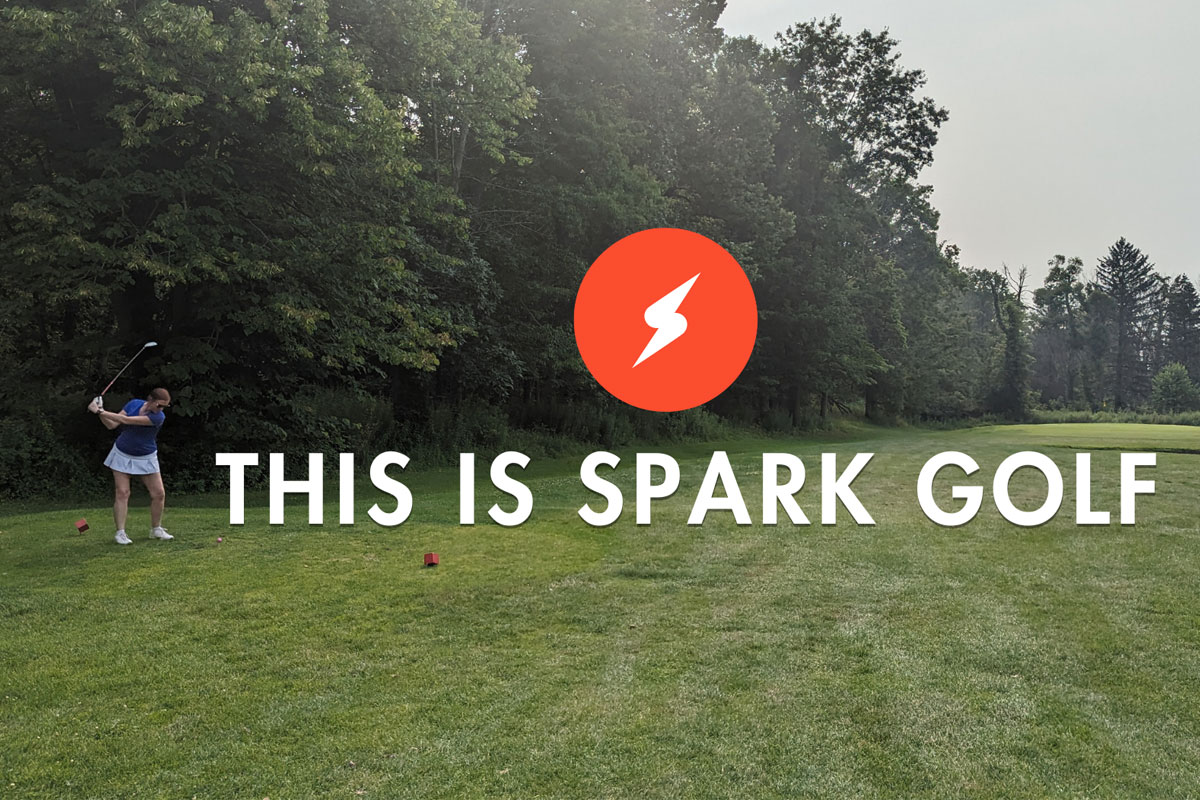 Woman playing golf on a green course. Golf swing in action.